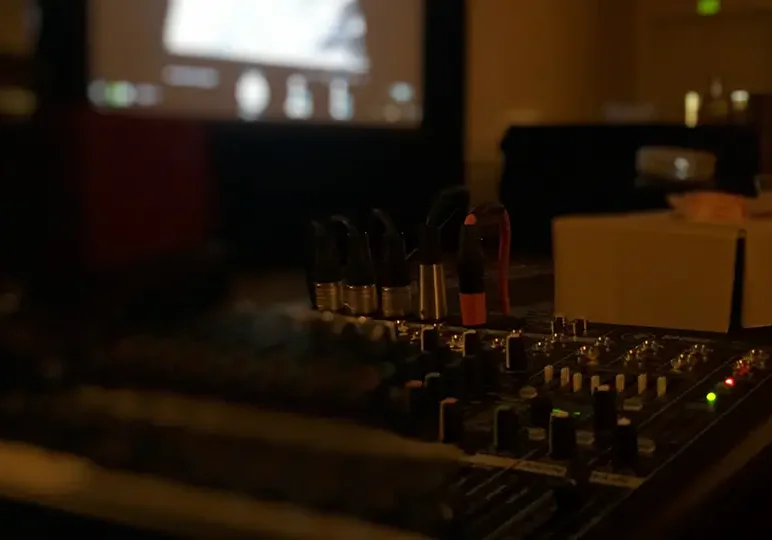 Sound equipment in a dimly lit room